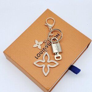 Authentic Louis Vuitton Gold Lock & Box w/ Unbranded Clover Bagcharm 122725
